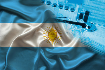 medical test tubes, stethoscope in the corner of the silk national flag of the state of Argentina,...