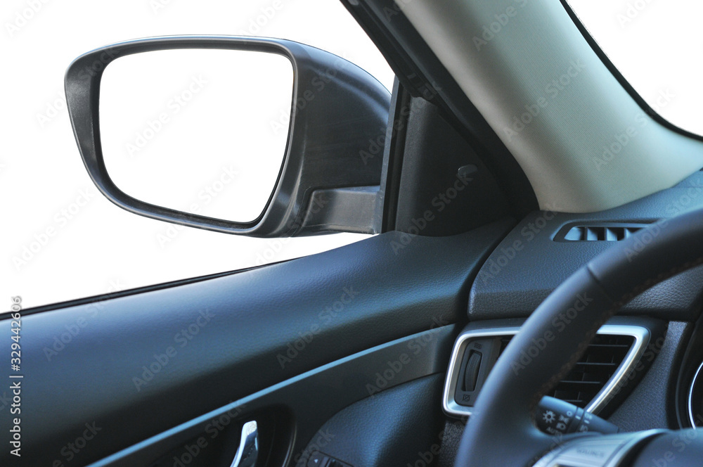 Wall mural car interior with a side-view mirror isolated on white