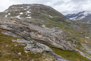 serpentine road leading to observation place in Dalsnibba mountain. Geiranger fjord Norway, selective focus.