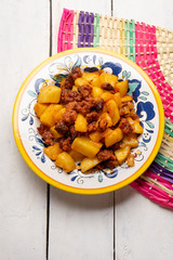 Mexican chorizo with potatoes on white background