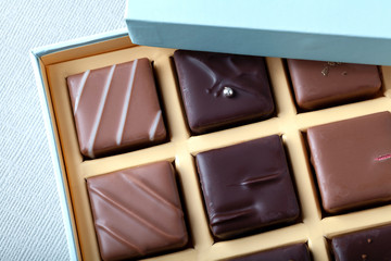 Natural chocolate candies in a beautiful cardboard box.