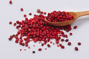 Red pepper in a wooden spoon.