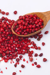 Red pepper in a wooden spoon.