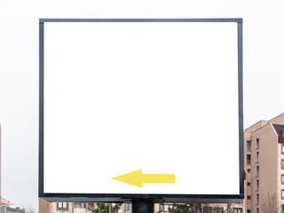  yellow arrow on blank billboard in city and sky
