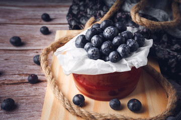 Still life of strawberry and blueberries. Dark food. Sweet dessert.