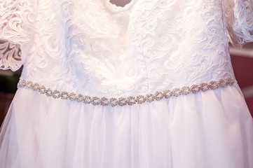 Fototapeta na wymiar Part of white wedding dress