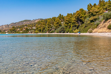 Halkidiki, Greece - September 04,2019: A beautiful Greek beach on the Aegean Sea in Halkidiki....