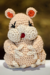  crocheted flowers and toys