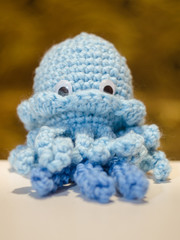  crocheted flowers and toys