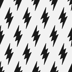 Vector flash seamless pattern. Cartoon black and white design. Artistic endless thunderbolt background