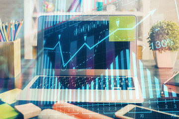 Multi exposure of forex chart and work space with computer. Concept of international online trading.