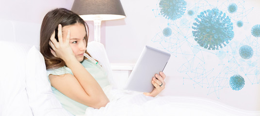 Teenage girl sick with virus with fever stays in bed and to relax watch videos in tablet