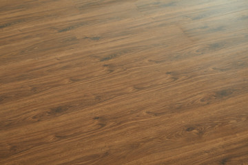 Fototapeta premium Wooden natural texture. New parquet blank. Wooden laminate floor boards background image. Home decor.