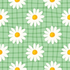 Daisy seamless pattern on hand drawn checked background. Floral ditsy print with small white flowers and leaves. Chamomile trend design great for fashion fabric, kitchen textile and wallpaper.