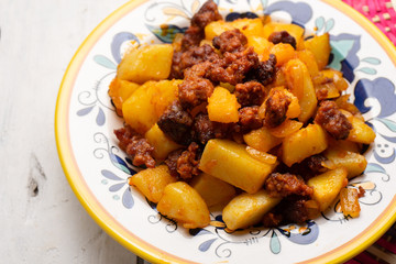 Mexican chorizo with potatoes on white background