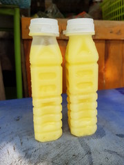 Closeup of fresh corn milk for sale in the park.  Nutritious drink concept.