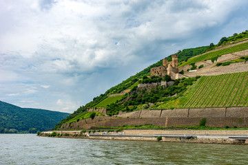 Germany, Rhine Romantic Cruise, a large body of water with a mountain in the background