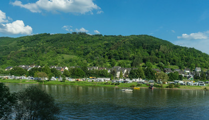 Fototapeta premium Germany, Hiking Frankfurt Outskirts, a large body of water with a mountain in the background