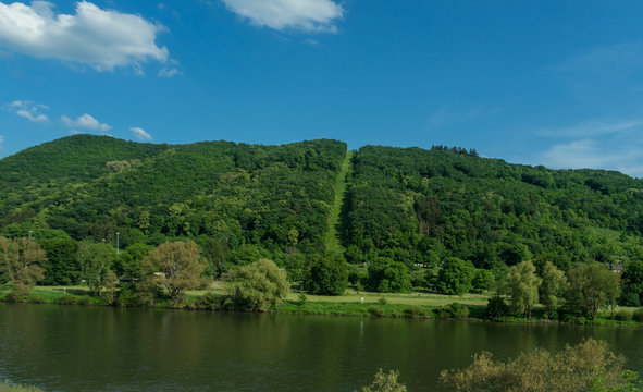 Germany, Hiking Frankfurt Outskirts, a body of water surrounded by trees © SkandaRamana