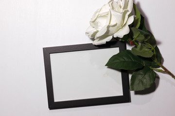 Frame mockup with white flowers