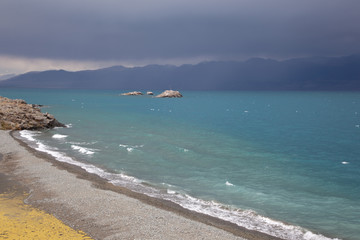 Lake in Mogolia in front of mountains