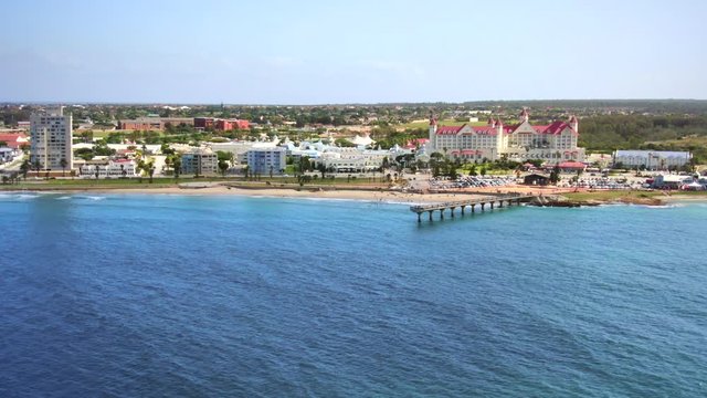 Shark Rock Pier and Hobie Beach in Summerstrand, smooth aerial push in camera movement reveals wide beachfront landscape in Port Elizabeth