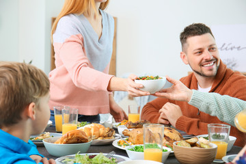 Family celebrating Thanksgiving Day at home