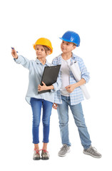 Cute little architects on white background