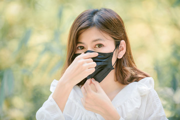 Business women wears a health mask