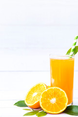 Fresh orange juice with slices fruits, isolated on white background, Selective focus, Copy space..
