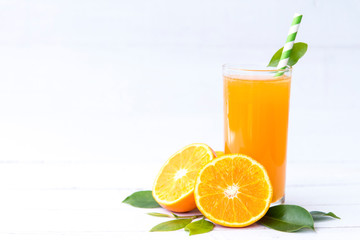 Fresh orange juice with slices fruits, isolated on white background, Selective focus, Copy space.