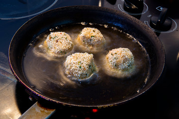 Fry the arancini ball in the oil