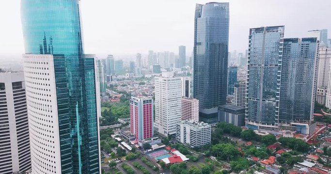 Aerial view of office buildings on misty morning