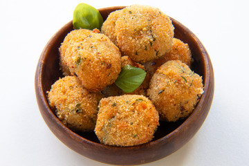 Deep Fried Tomato Sauce Risotto Balls with basil