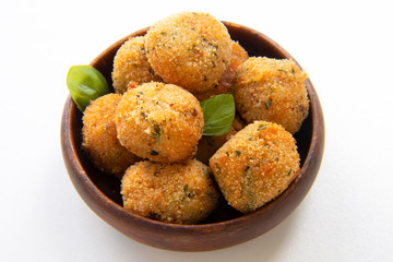 Deep Fried Tomato Sauce Risotto Balls with basil