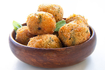 Deep Fried Tomato Sauce Risotto Balls with basil