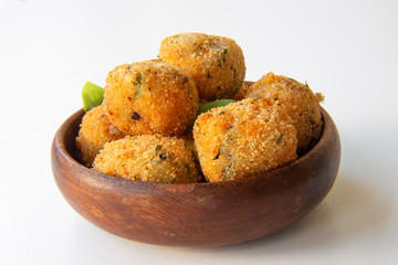Deep Fried Tomato Sauce Risotto Balls with basil