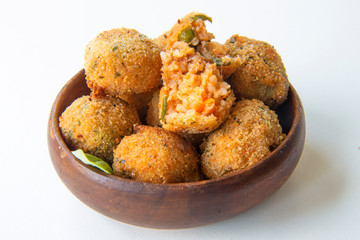 Deep Fried Tomato Sauce Risotto Balls with basil