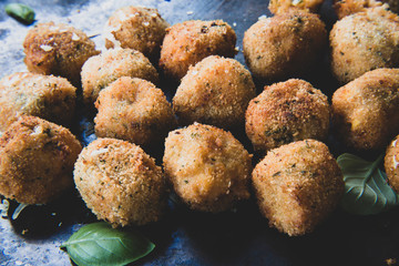 Deep Fried Tomato Sauce Risotto Balls with basil