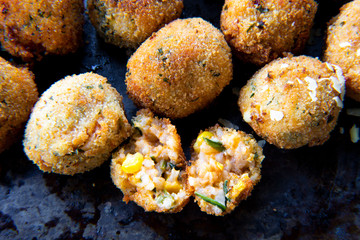 Deep Fried Tomato Sauce Risotto Balls with basil