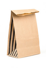 Brown paper bag isolated on a white background.