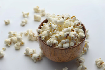 Close up of popcorn in a wooden bowl 