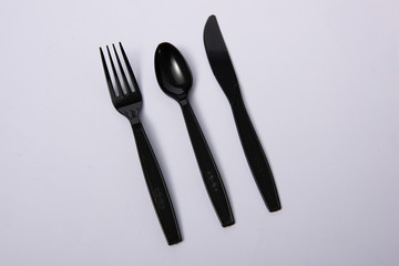 A disposable fork spoon. Quick and comfortable to use at parties. Recycle tableware. Plastic processing problems