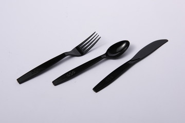 A disposable fork spoon. Quick and comfortable to use at parties. Recycle tableware. Plastic processing problems