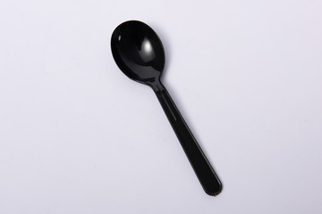 A disposable fork spoon. Quick and comfortable to use at parties. Recycle tableware. Plastic processing problems
