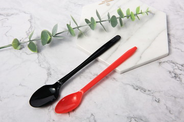 A disposable fork spoon. Quick and comfortable to use at parties. Recycle tableware. Plastic processing problems