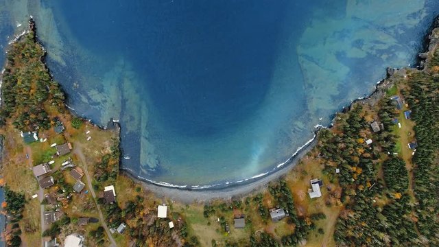 Rising Overhead Aerial Drone Shot Of Coast With Houses And Forest And A Lake (Lake Superior, Great Lakes, Ontario, Canada)