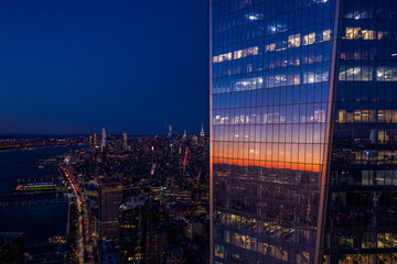 Aerial view of New York city One World Trade Center at dusk