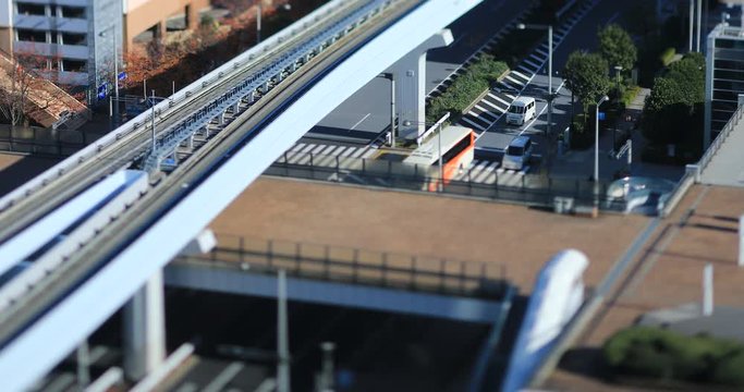 Moving train on the miniature railway at Yurikamome line in Tokyo tiltshift