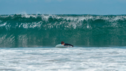 The guy is a beginner surf covers big wave